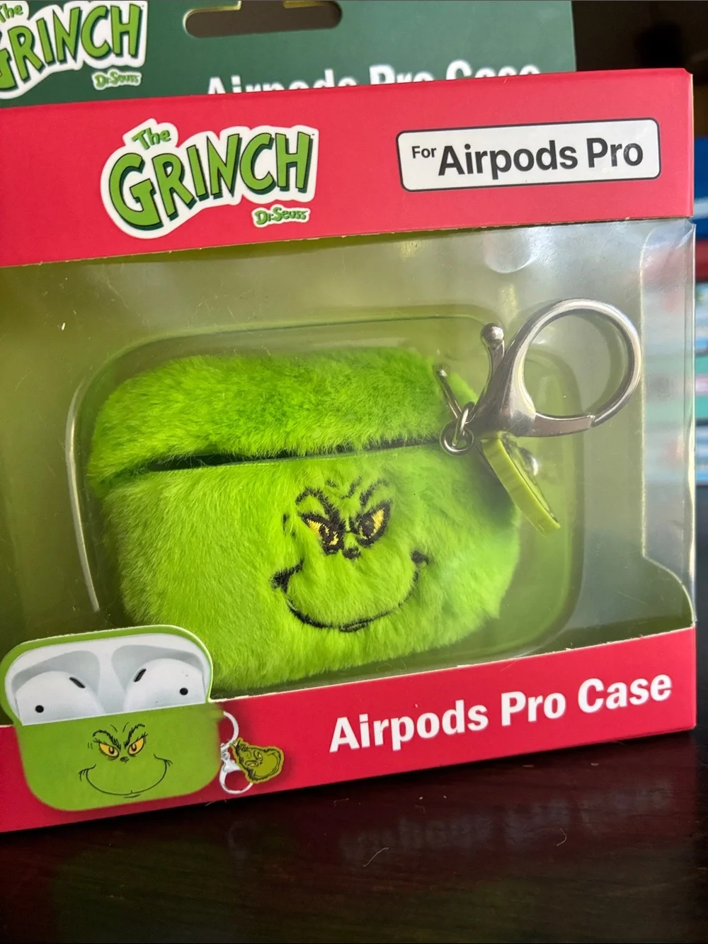 The Grinch Plush AirPods Pro Case in Bright Green with Keyring